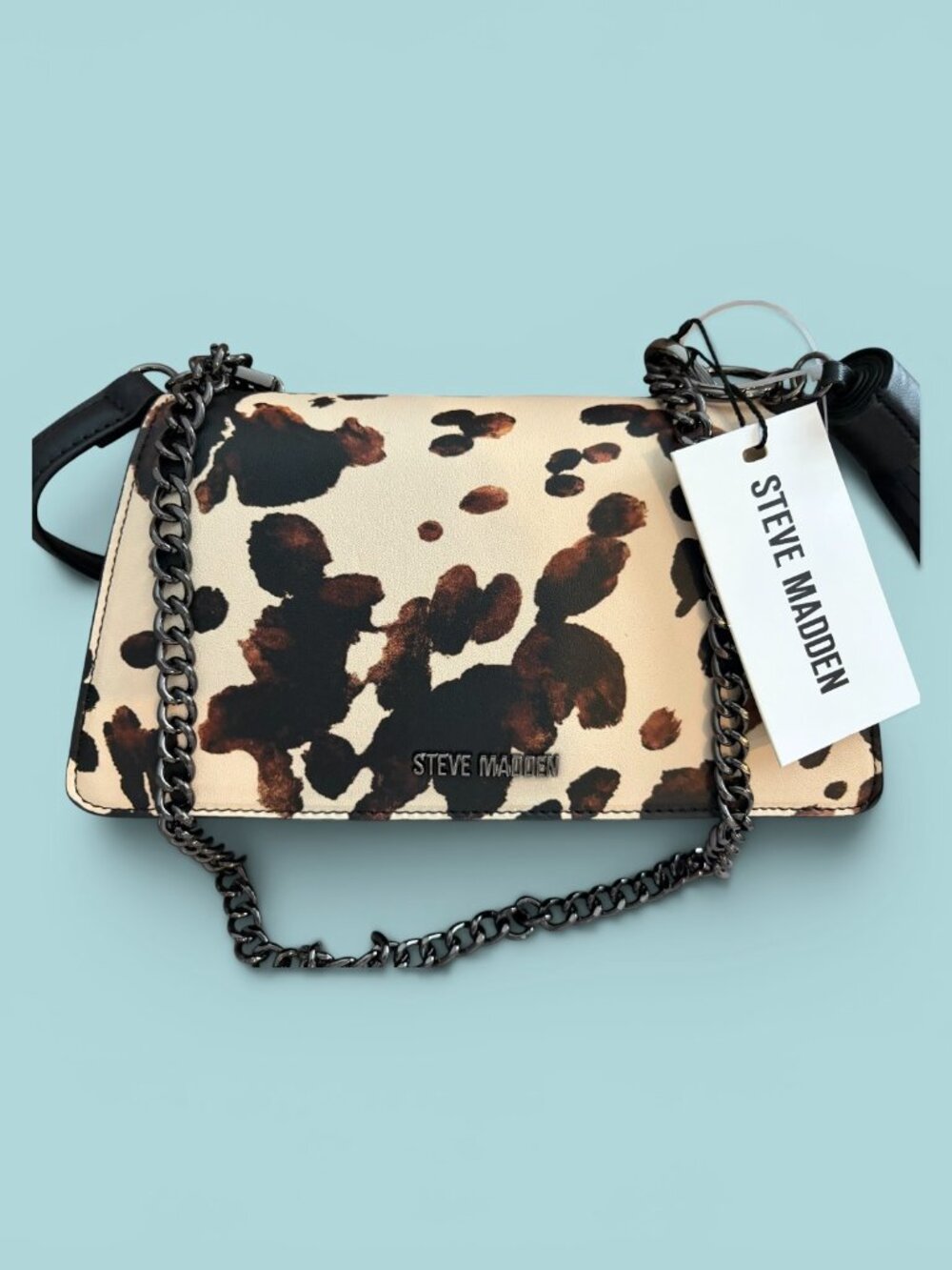 Steve Madden Cow Print Crossbody bag w/black leather tassel